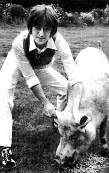 Lennon parodies the cover photo of Paul's RAM album on IMAGINE